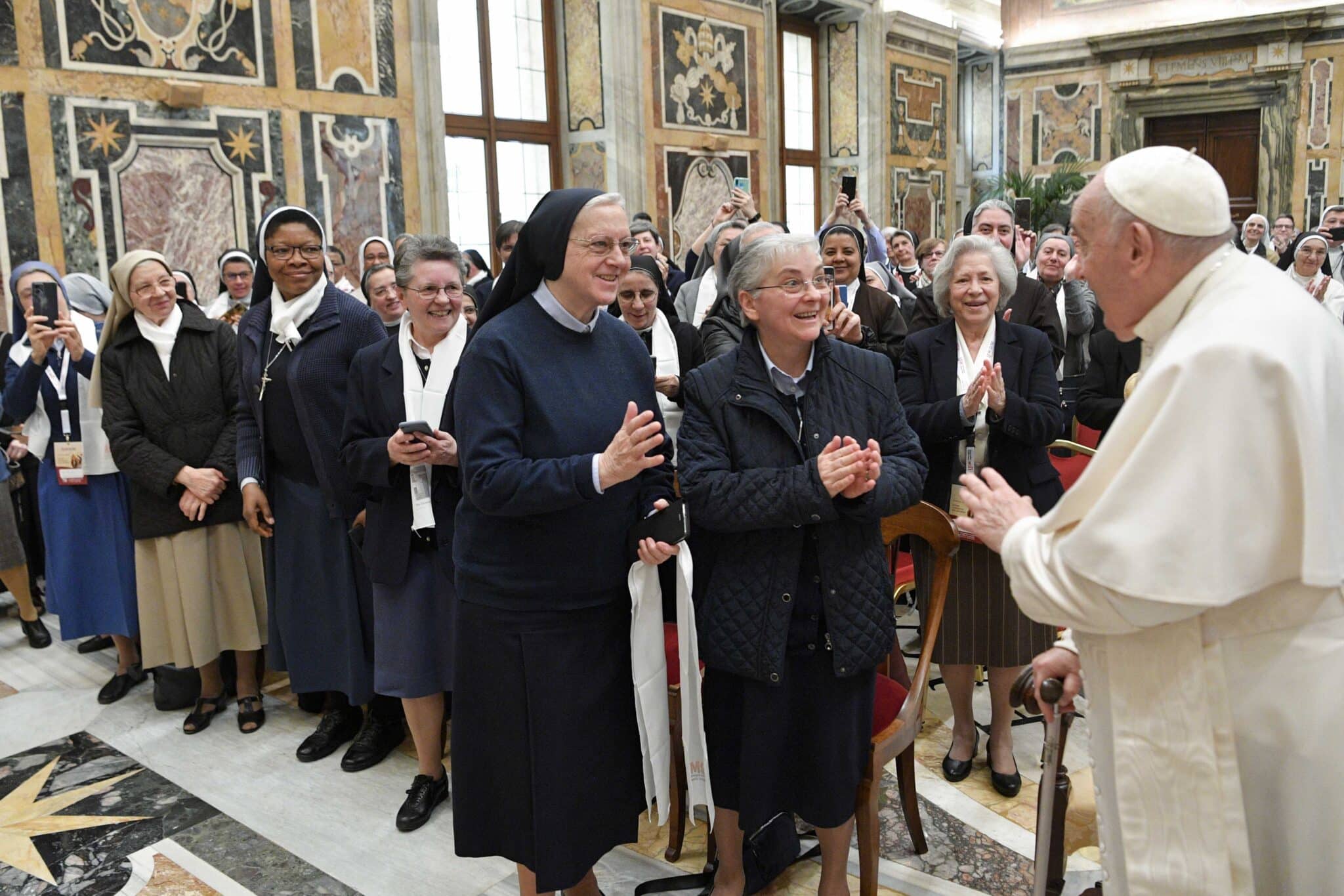 Pope Francis greets members of the general assembly of the women's Union of Major Superiors of Italy during an audience at the Vatican April 13, 2023. (CNS photo/Vatican Media)