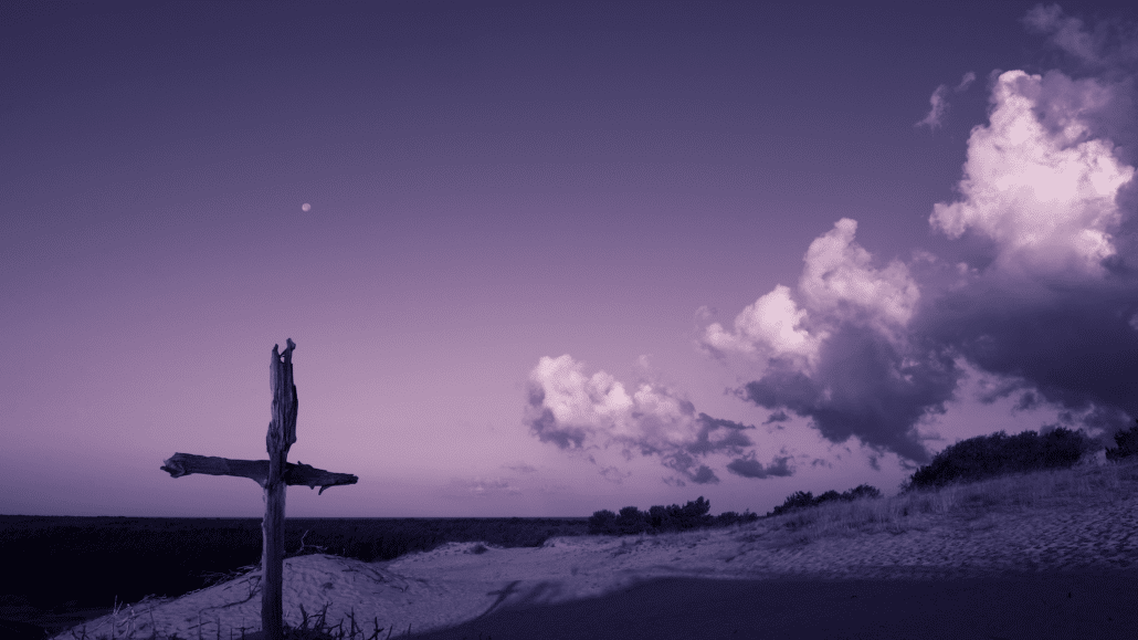 Cross on a mountainside