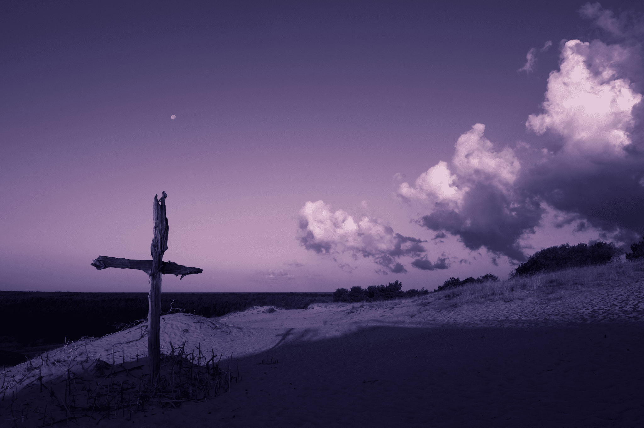 Cross on a mountainside