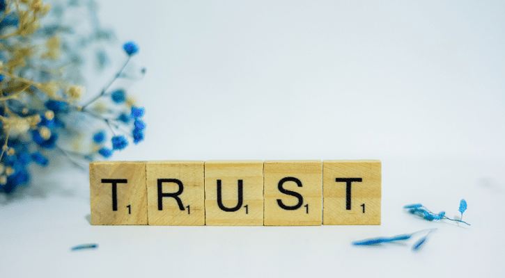 letter tiles spelling the word trust