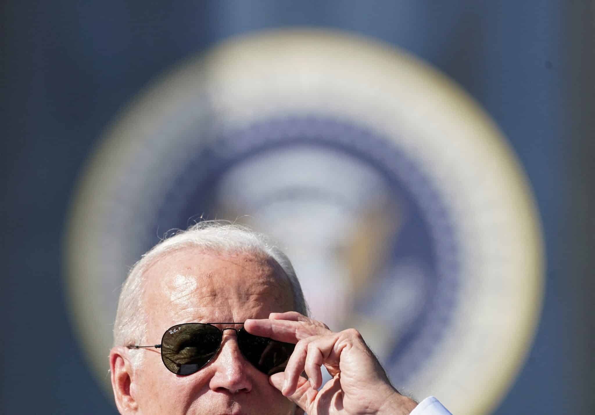 U.S. President Joe Biden adjusts his glasses as he celebrates the enactment of the Inflation Reduction Act of 2022 on the South Lawn at the White House in Washington Sept. 13, 2022. Biden signed the measure into law that August. On April 25, 2023, Biden announced that he will seek a second term in the White House. (OSV News photo/Kevin Lamarque, Reuters)
