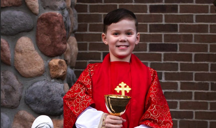 Nine-year-old Teddy Howell, seen in an undated photo, wants to be a podcaster and a priest. Inspired by Father Mike Schmitz's popular podcast, "The Bible in a Year," the third-grader at St. Charles Borromeo Academy in Newport, Mich., has achieved one of those goals with the recent launch of his own podcast: "Kid's Bible In A Year with Teddy." (OSV News photo/courtesy Howell family)