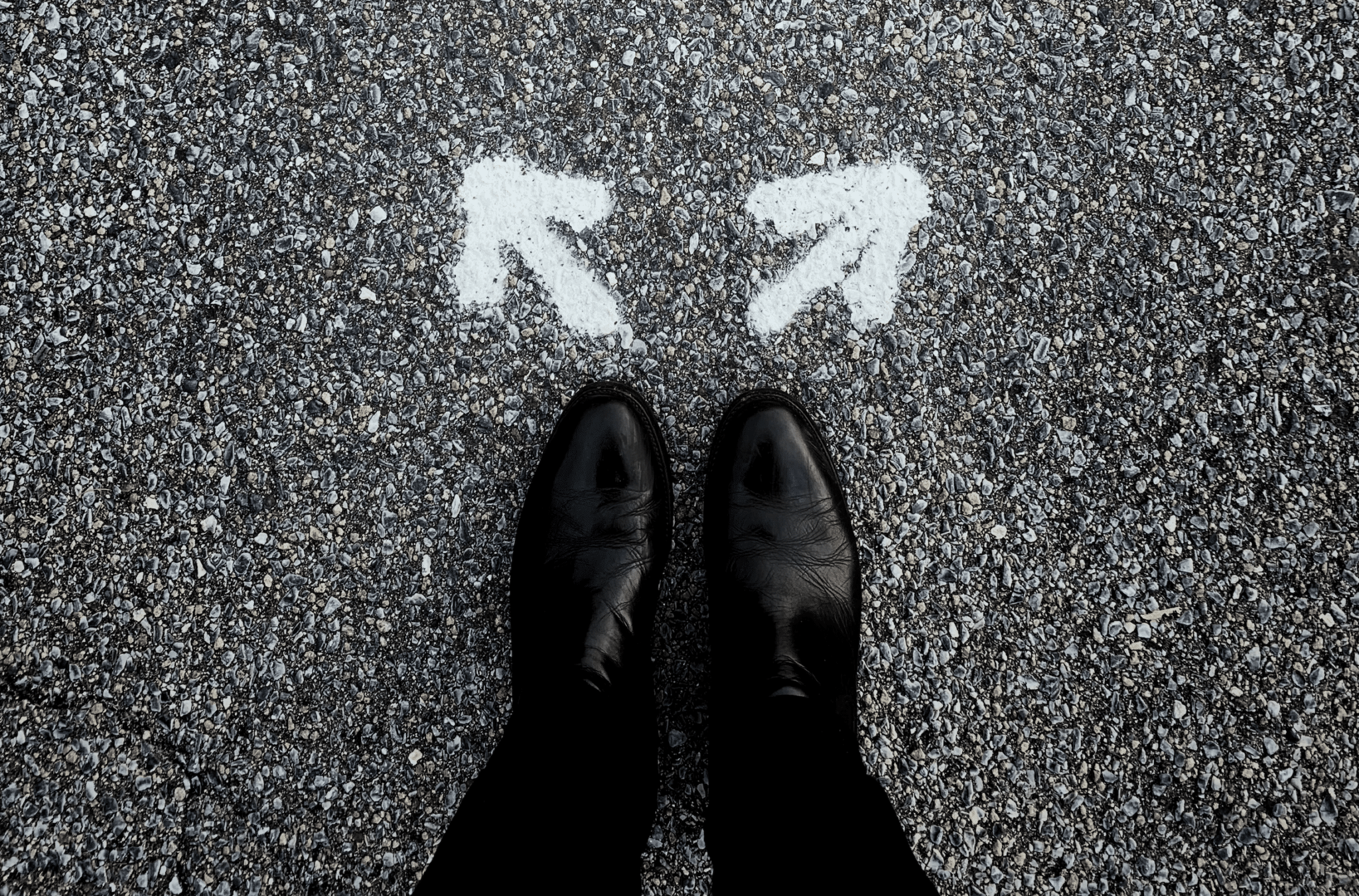 arrows and feet | Photo by Jon Tyson on Unsplash