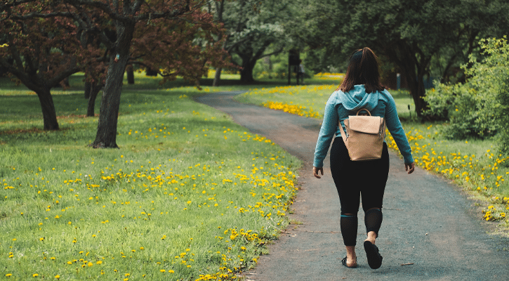 Woman walking on path