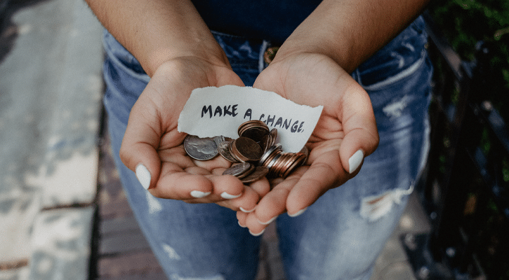 woman with coins in her hands