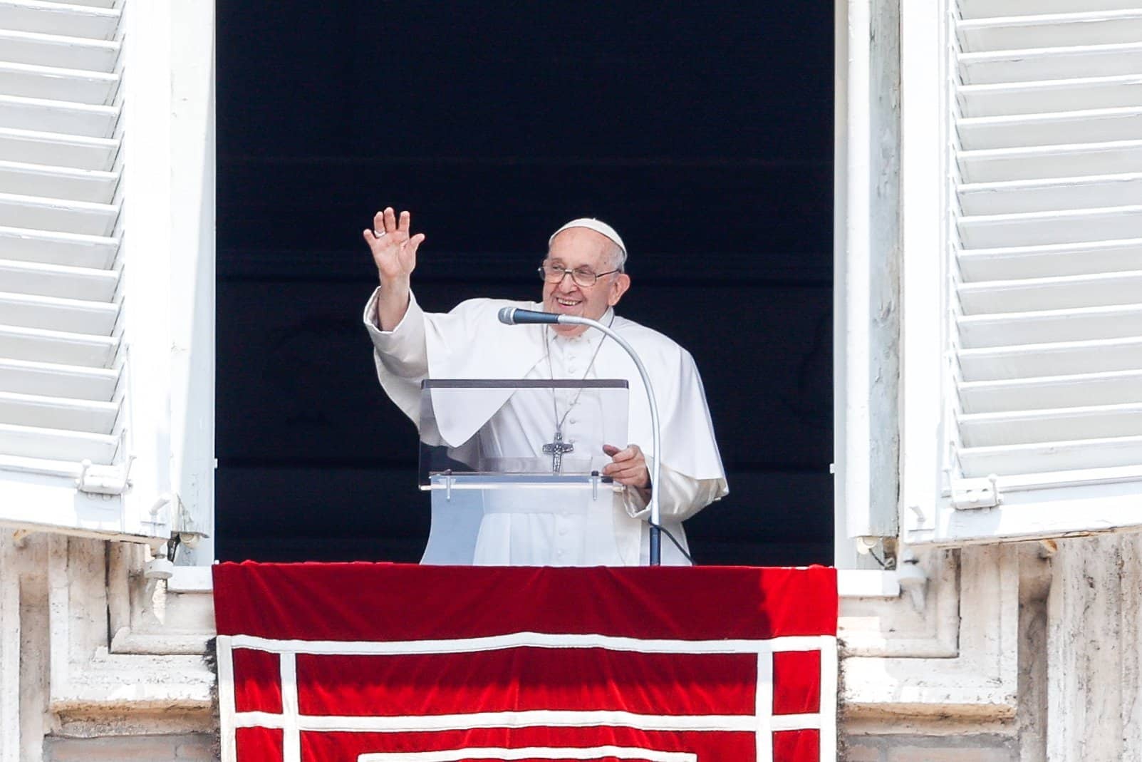 Pope Francis waves at visitors gathered in St. Peter's Square at the Vatican after praying the Angelus June 18, 2023. The pope published an apostolic letter for the 400th anniversary of the birth of French philosopher Blaise Pascal June 19. (CNS photo/Lola Gomez)