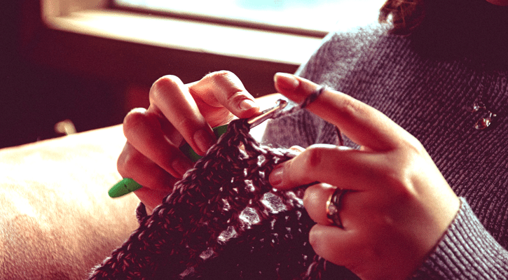hands of a woman knitting