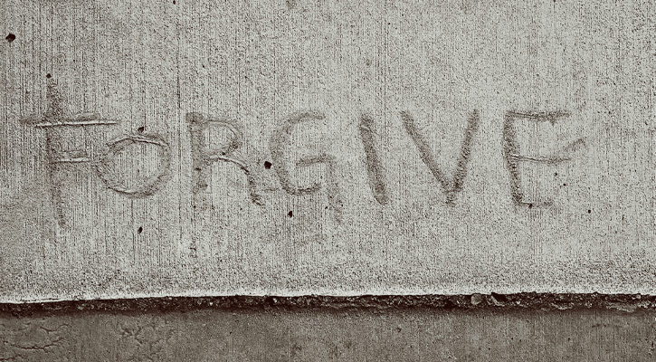 forgive written on sidewalk