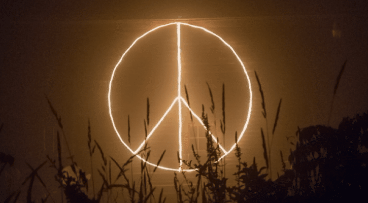 illuminated peace symbol