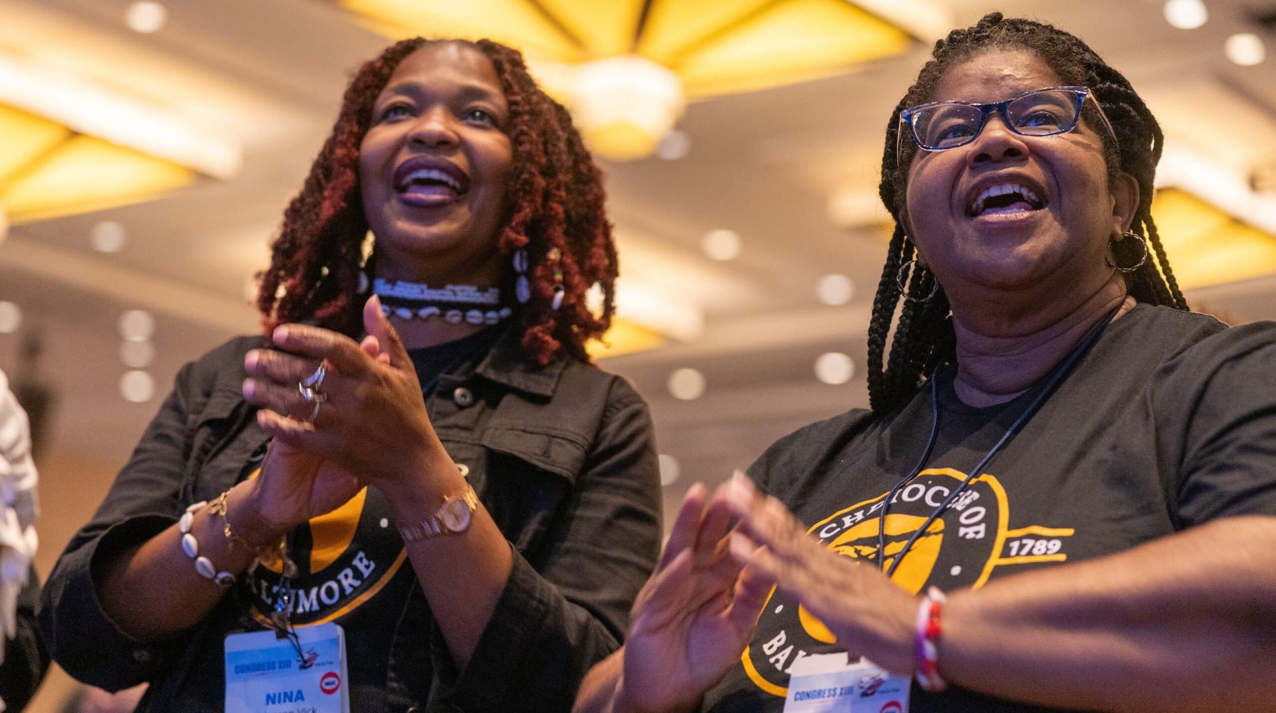 Two people smiling at National Black Catholic Congress in Maryland