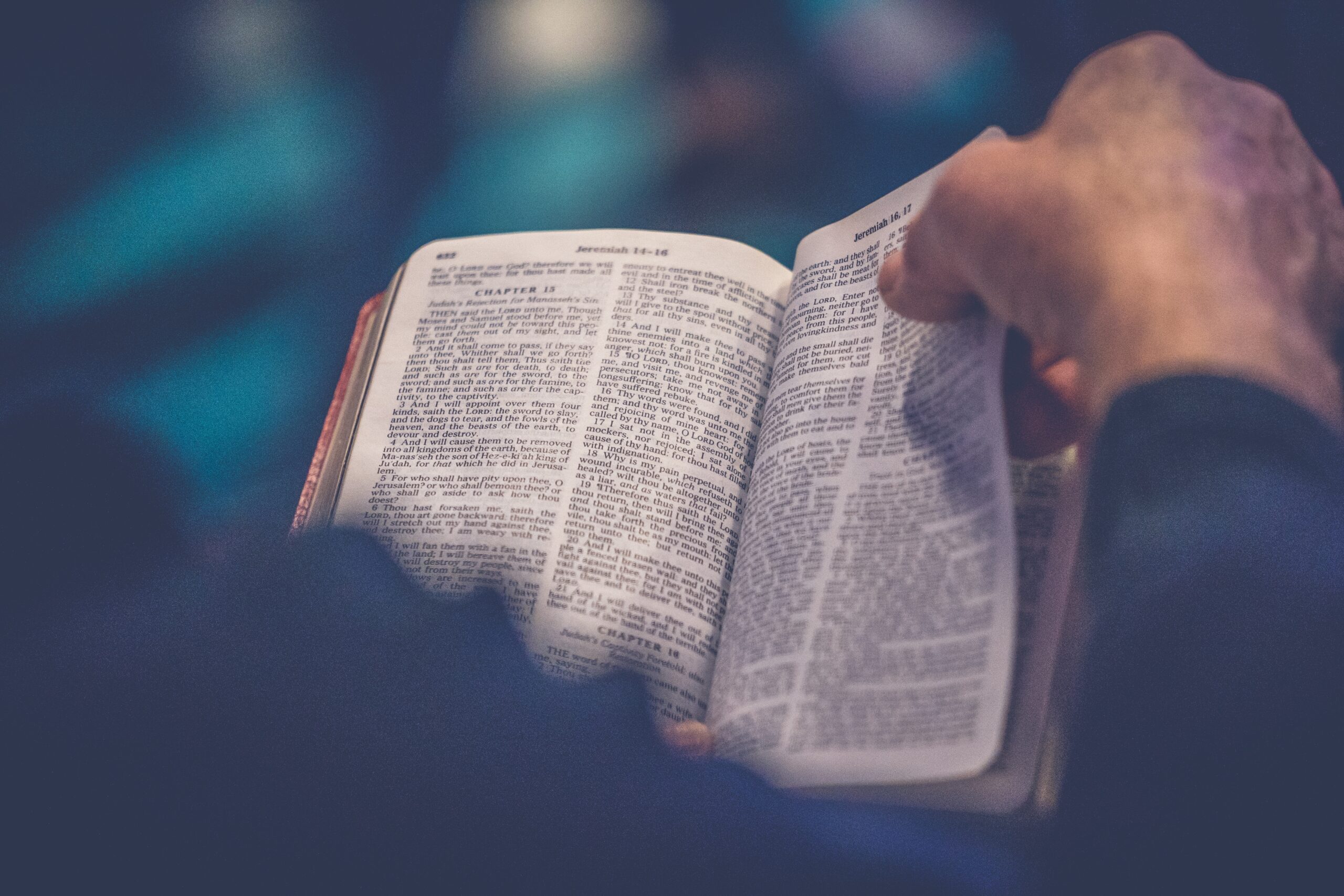 man reading the bible | Photo by Rod Long on Unsplash