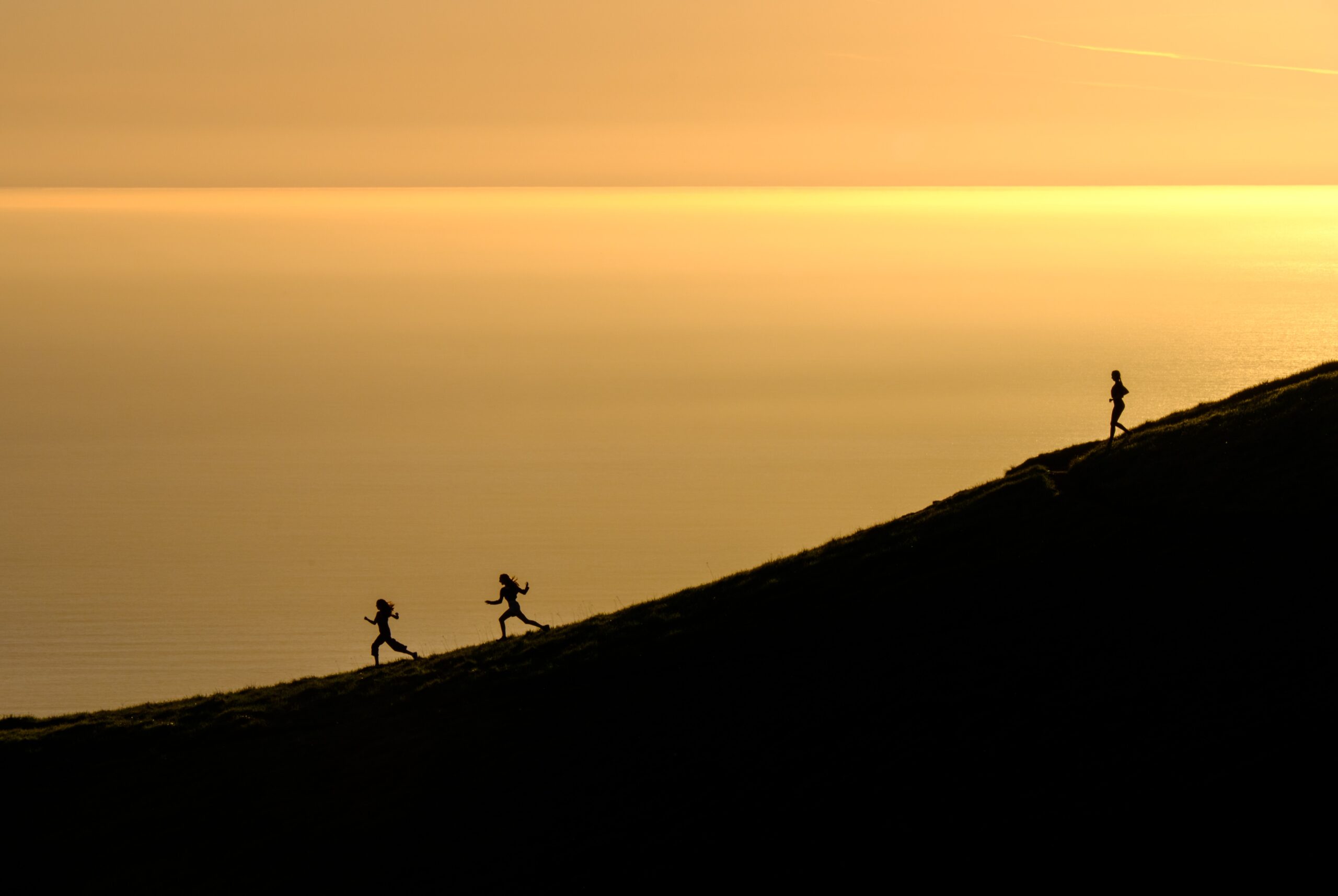 running down hill | Photo by Todd Diemer on Unsplash