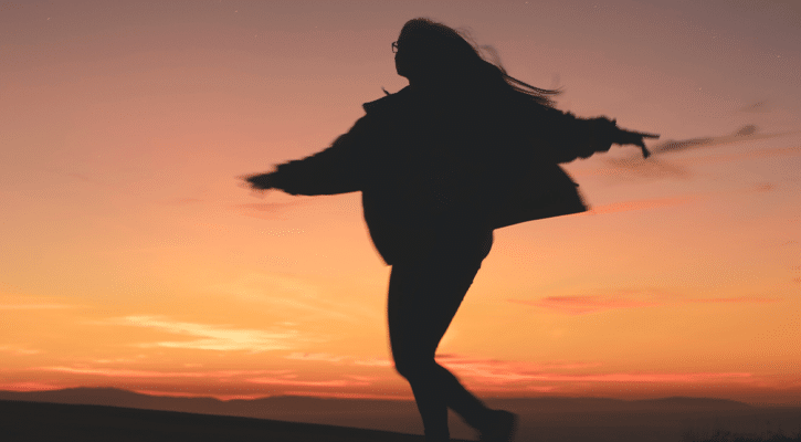 silhouette of a woman dancing