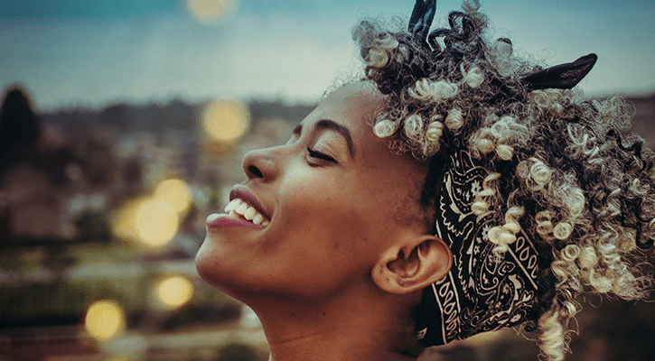 woman smiling joyfully