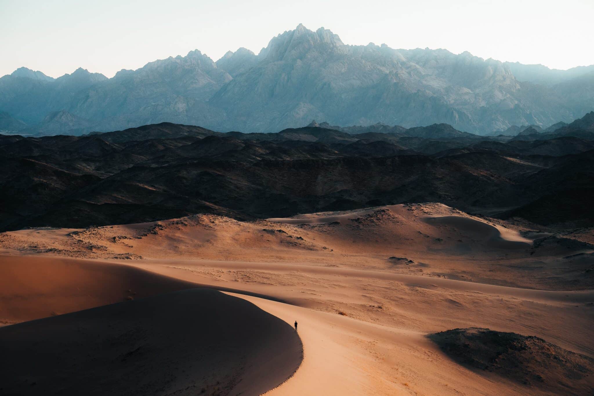 man in the desert | Photo by NEOM on Unsplash