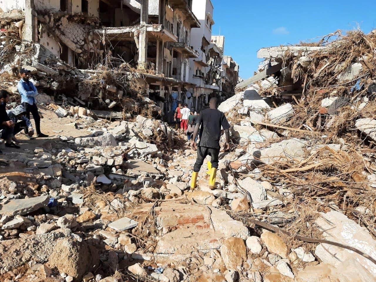 Members of Libyan Red Crescent Ajdabiya work in an area affected by flooding in Derna Sept. 12, 2023. On Sept. 13, the authorities estimated that over 5,100 people had died and 10,000 were reportedly missing. (OSV News photo/Libyan Red Crescent Ajdabiya via Reuters)