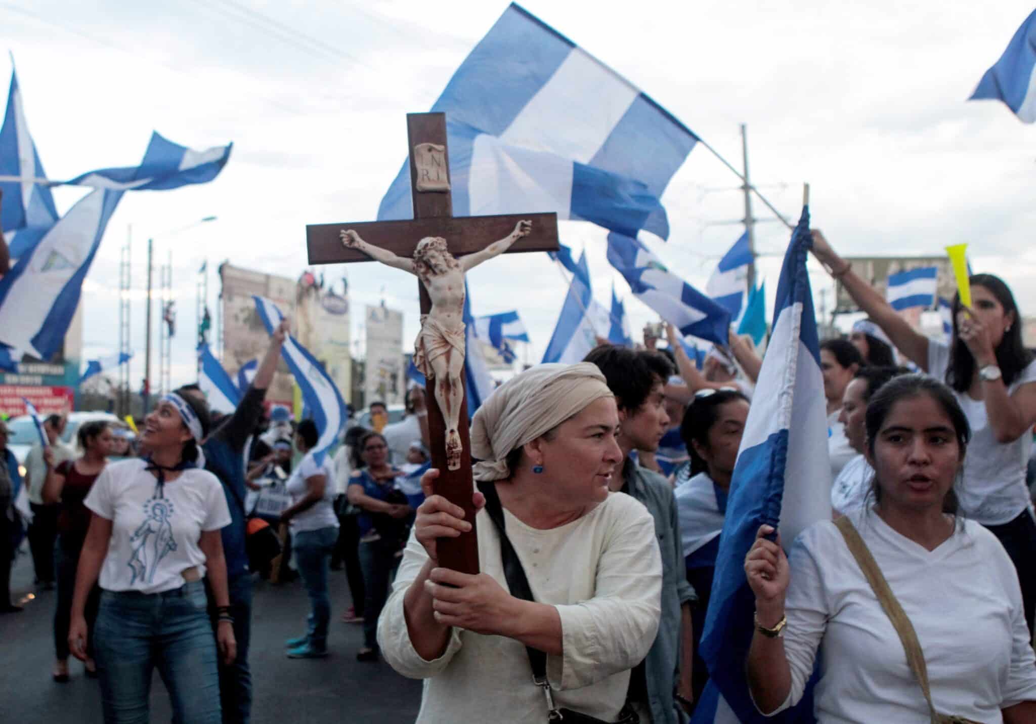 A demonstrator holds a crucifix during a protest against Nicaraguan President Daniel Ortega's government in Managua May 15, 2018. (OSV News photo/Oswaldo Rivas, Reuters)