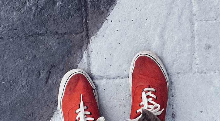 pair of shoes along a line on the floor