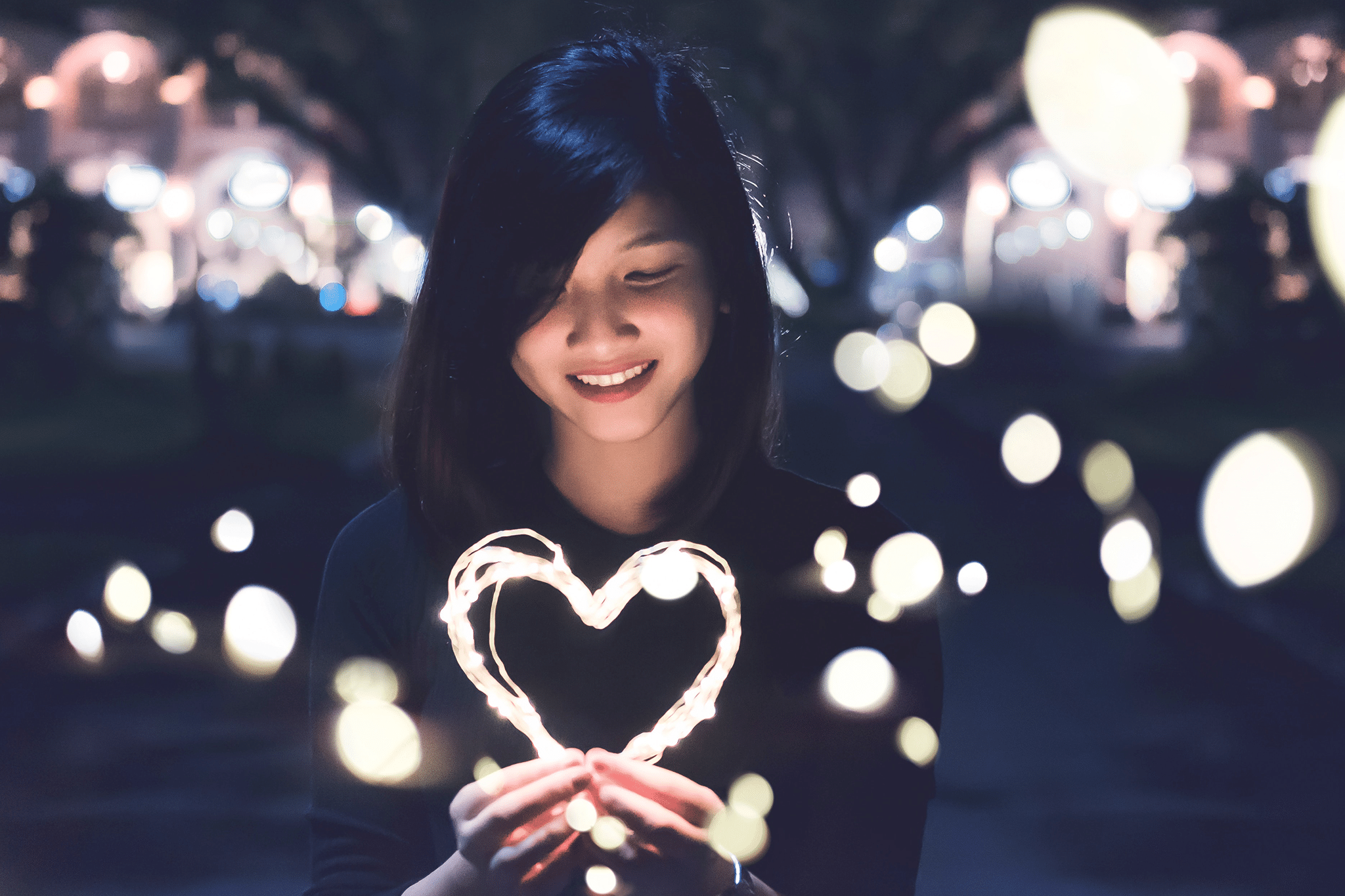 Woman holding heart