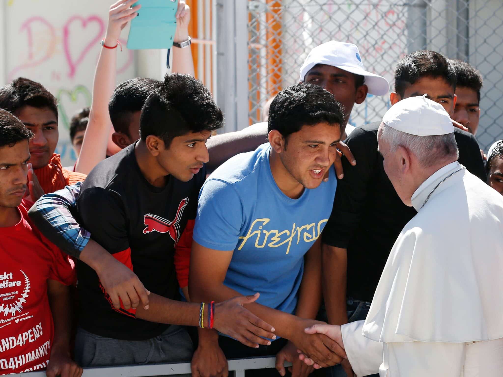 In this file photo, Pope Francis meets refugees at the Moria refugee camp on the island of Lesbos, Greece, in 2016. (CNS photo/Paul Haring)