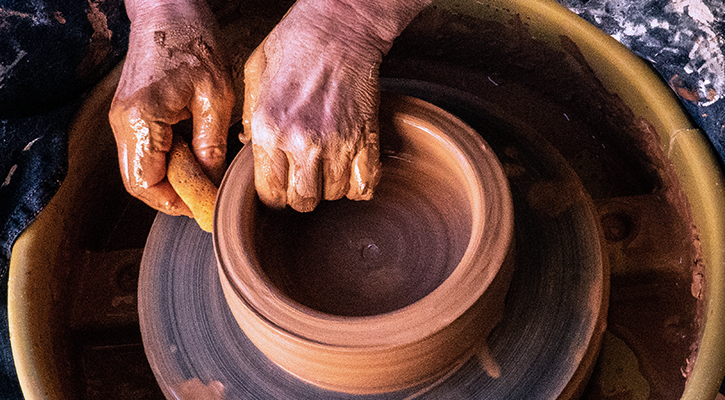 Potter making pottery