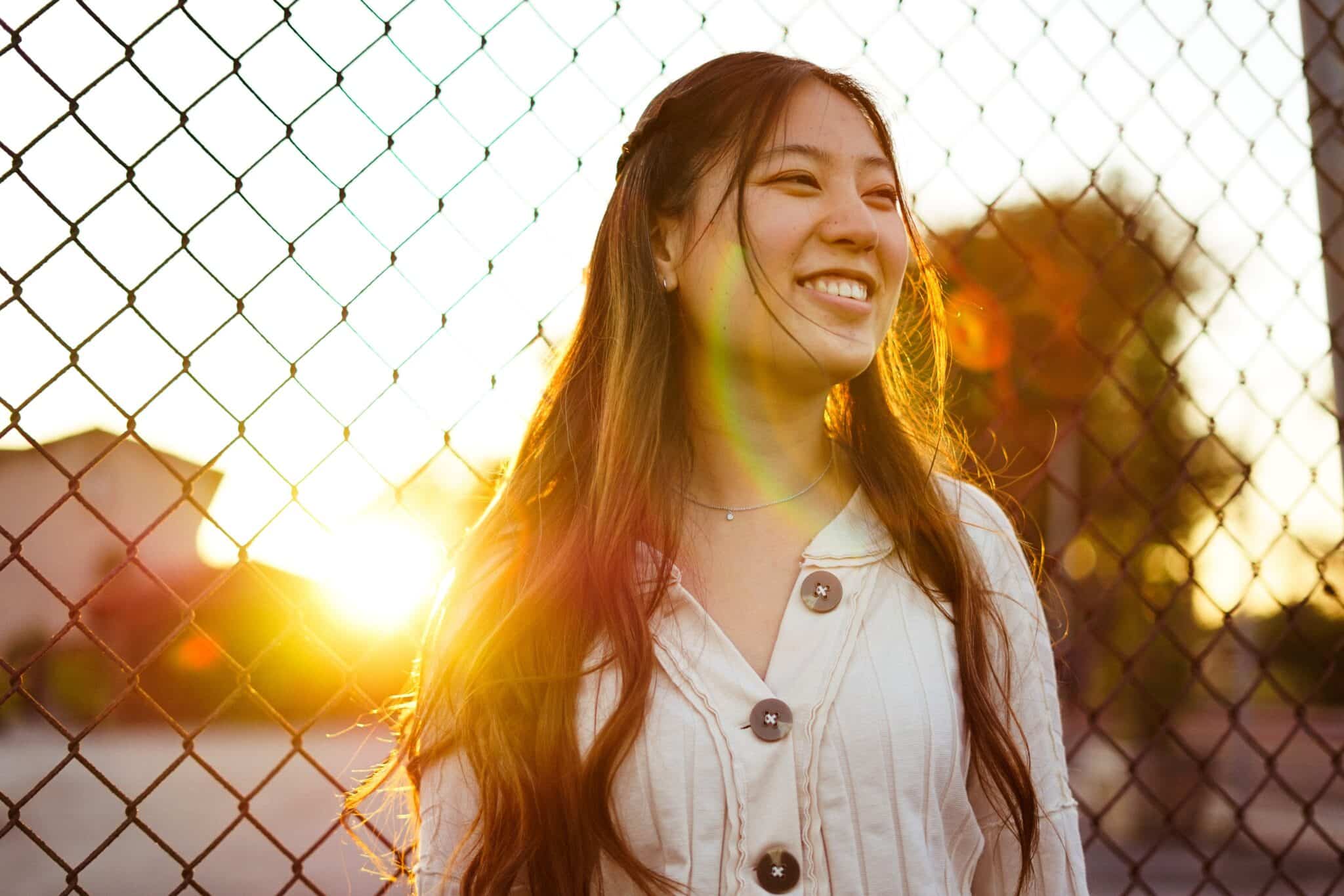 woman smiling | Photo by Conner Ching on Unsplash