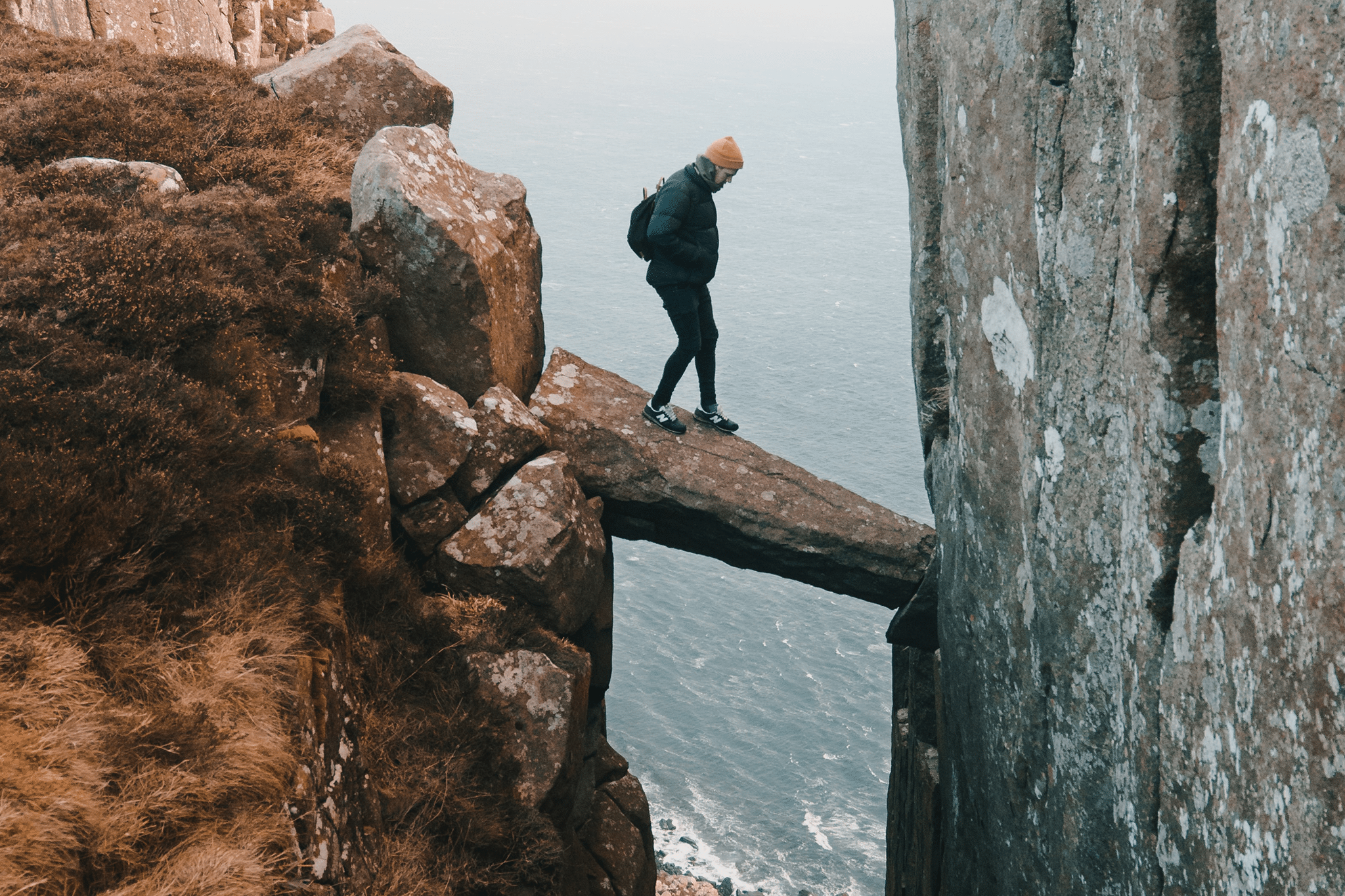 man rock climbing