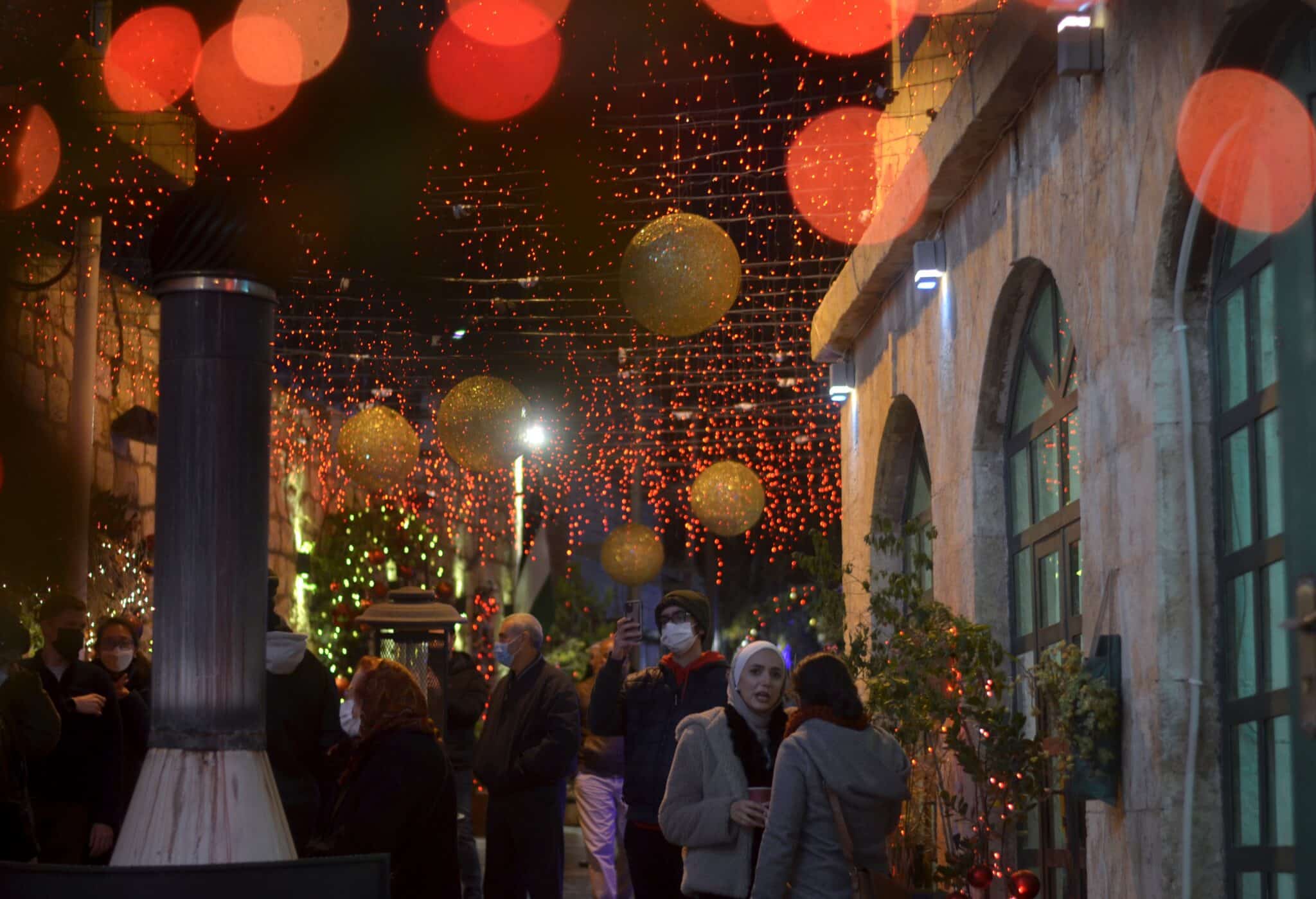 People visit a Christmas market in the city of Fuheis near Amman, Jordan, Dec. 18, 2021. Churches in Jordan are canceling 2023 Christmas celebrations in solidarity with Gaza as violence in the Palestinian enclave mounts, the leaders of Jordan's Council of Church Leaders announced Nov. 5. (OSV News photo/Muath Freij, Reuters)