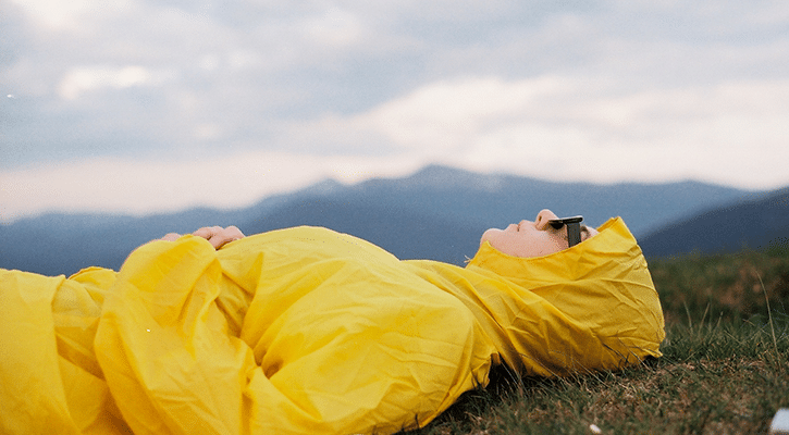 woman laying on her back, dreaming