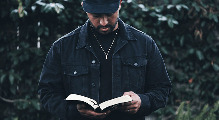 man reading the Bible