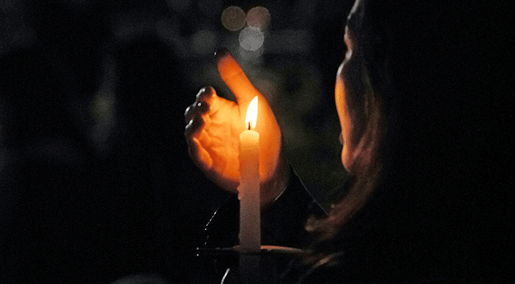 woman holding candle