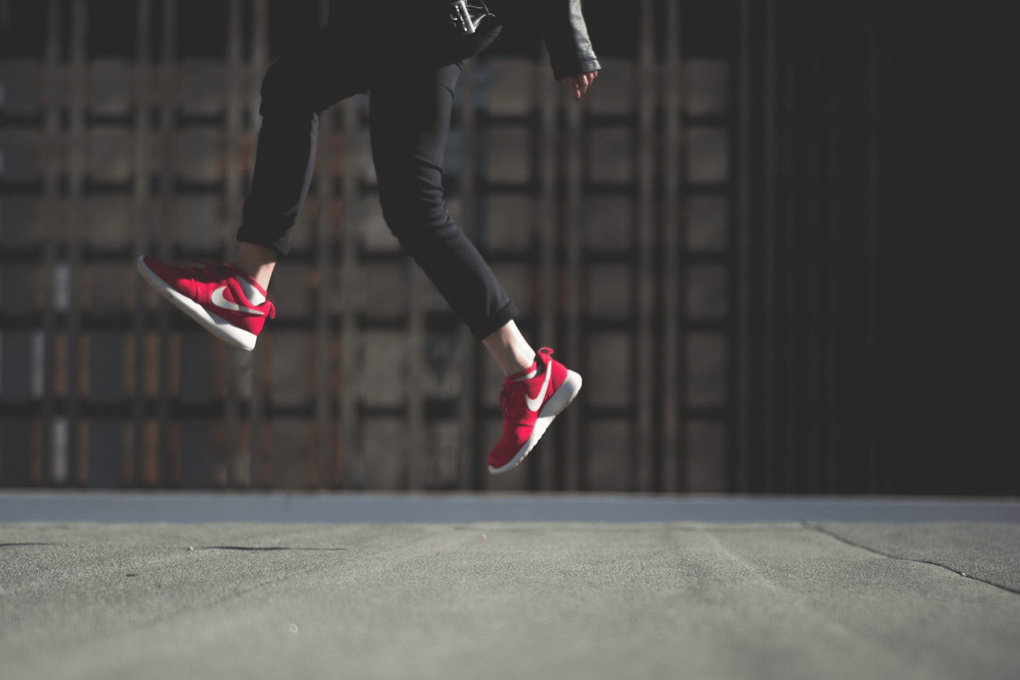 young woman leaping