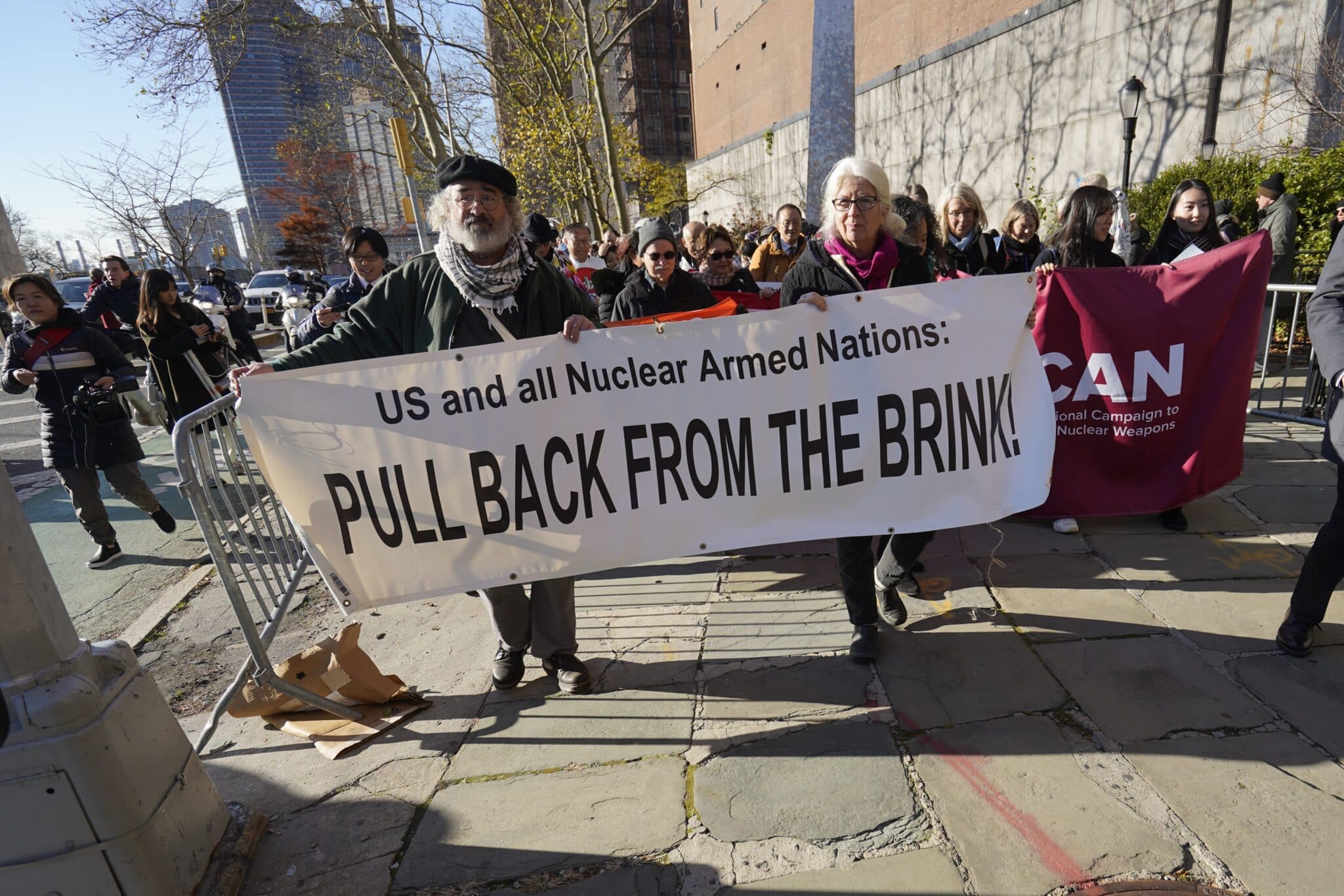 Brian Terrell, who lives on a Catholic Worker farm in Maloy, Iowa, and Martha Hennessy, granddaughter of Catholic Worker co-founder Dorothy Day, carry a banner in New York City during a march to abolish nuclear weapons Nov. 28, 2023. Catholic Worker and Pax Christi members were among the participants. The event coincided with the second Meeting of States Parties to the United Nations Treaty on the Prohibition of Nuclear Weapons taking place at U.N. headquarters in New York City Nov. 27-Dec. 1. (OSV News photo/Gregory A. Shemitz)