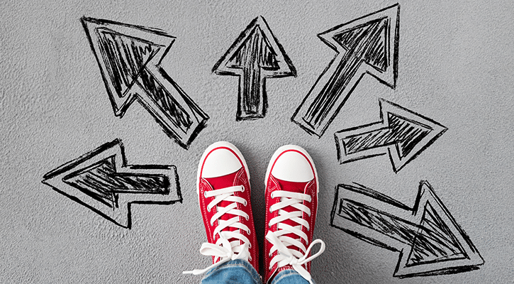 shoes surrounded by drawn arrows in different directions.