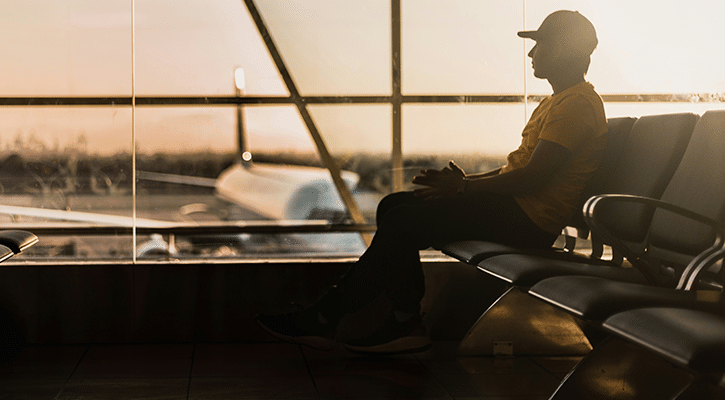 man waiting for his flight.