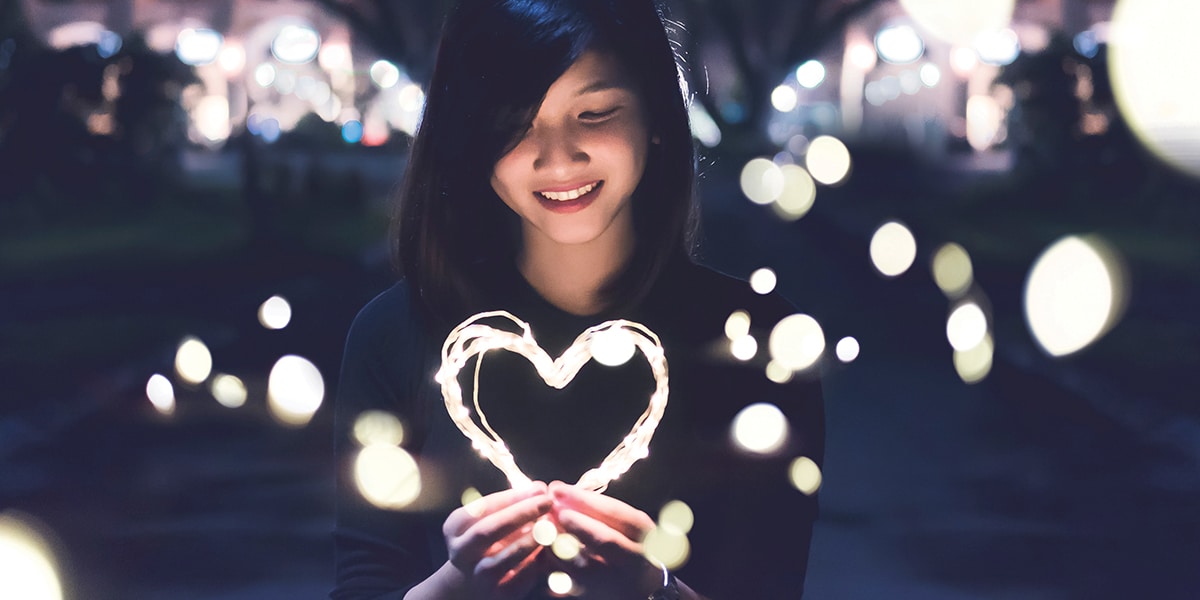 woman with a light up heart