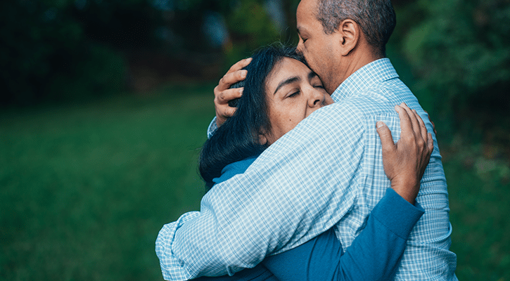 couple hugging, forgiving each other