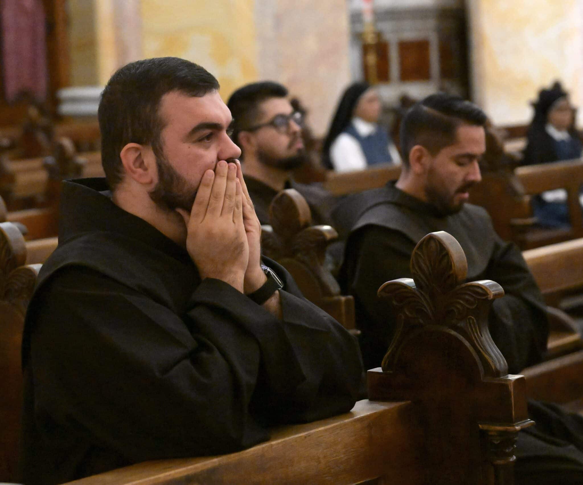 A Franciscan prays in St. Saviour Monastery on the day of prayers and fasting for peace in the Old City of Jerusalem, Oct.17, 2023. That day a massive blast rocked CNEWA-supported al-Ahli Arab Hospital in Gaza City packed with wounded and other Palestinians seeking shelter, killing hundreds of people, the Hamas-run Gaza Health Ministry said. (OSV News photo/Debbie Hill)