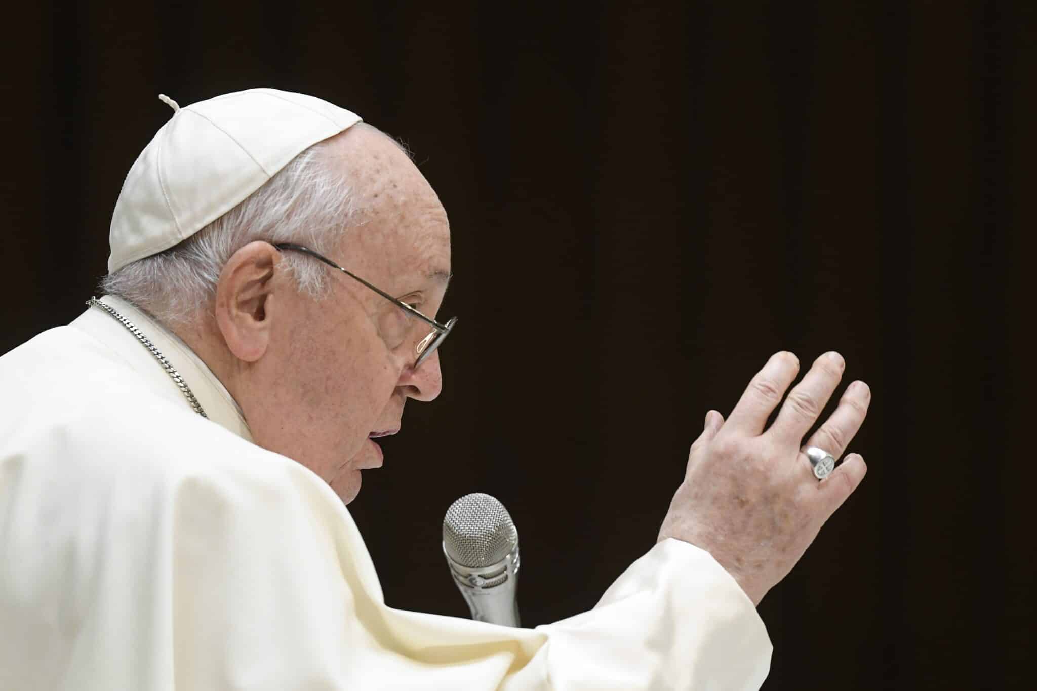 Pope Francis gives his blessing to visitors during his weekly general audience in the Paul VI Audience Hall at the Vatican Jan. 3, 2023. (CNS photo/Vatican Media)