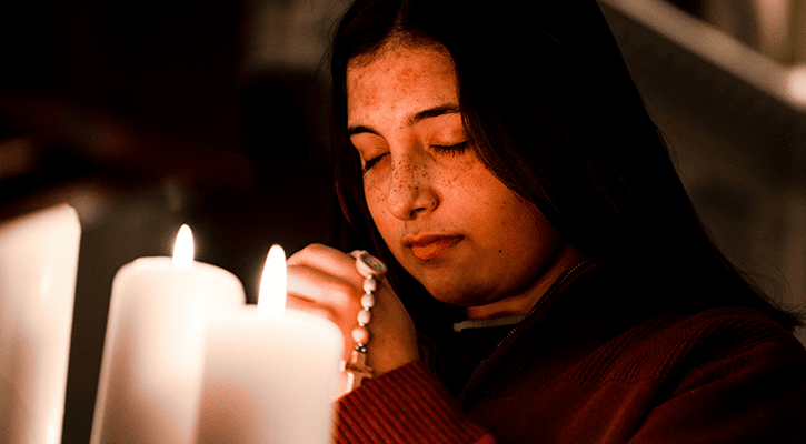 young woman praying