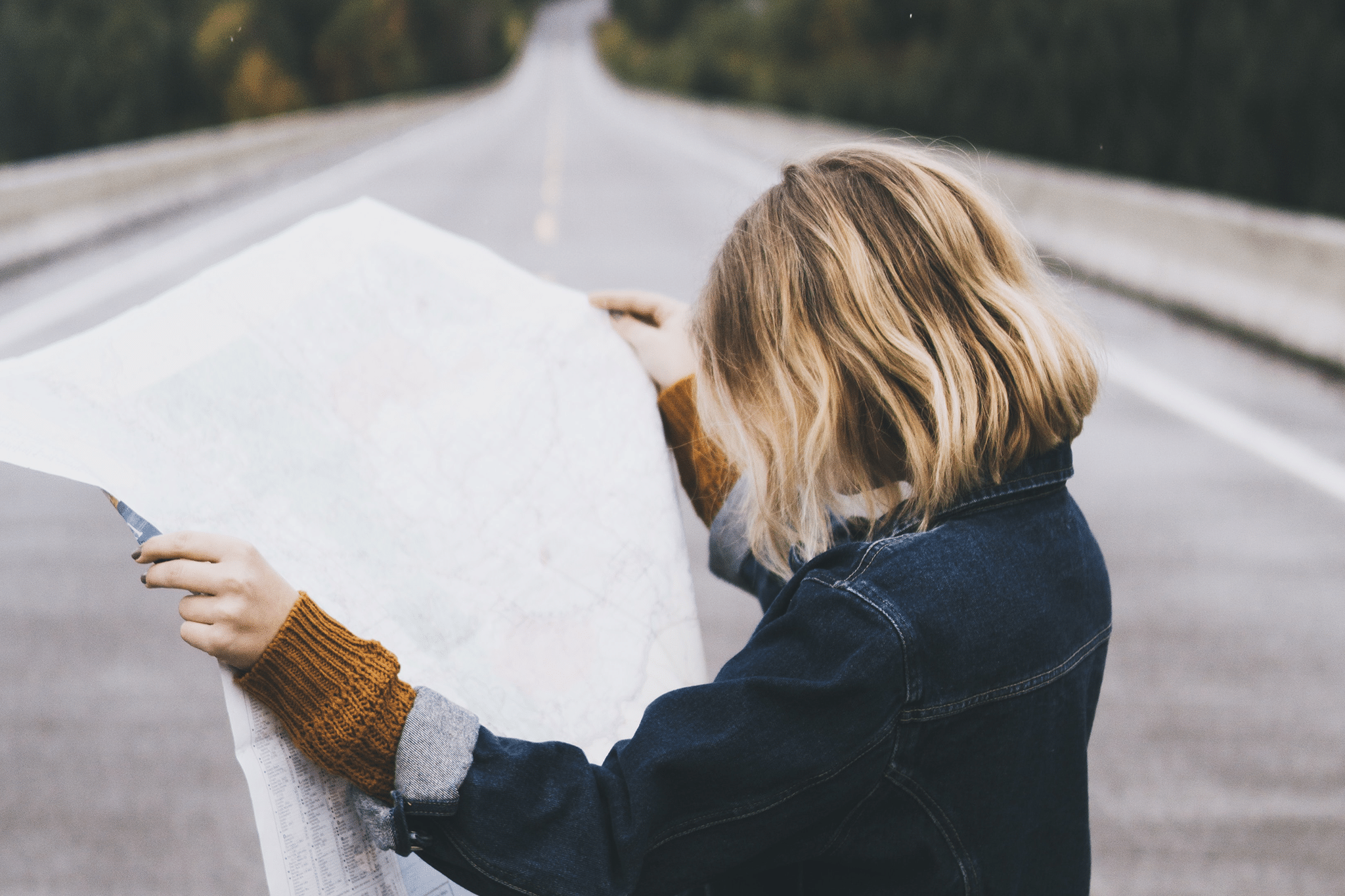 woman reading roadmap