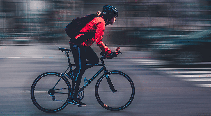 Young man riding bike