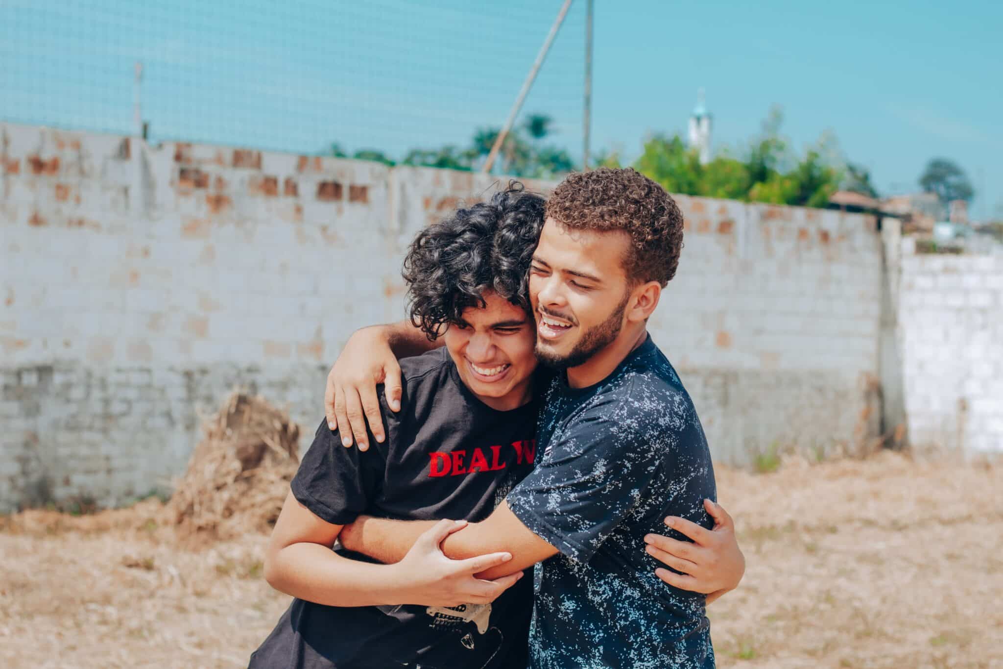 People hugging | Photo by Gui França on Unsplash