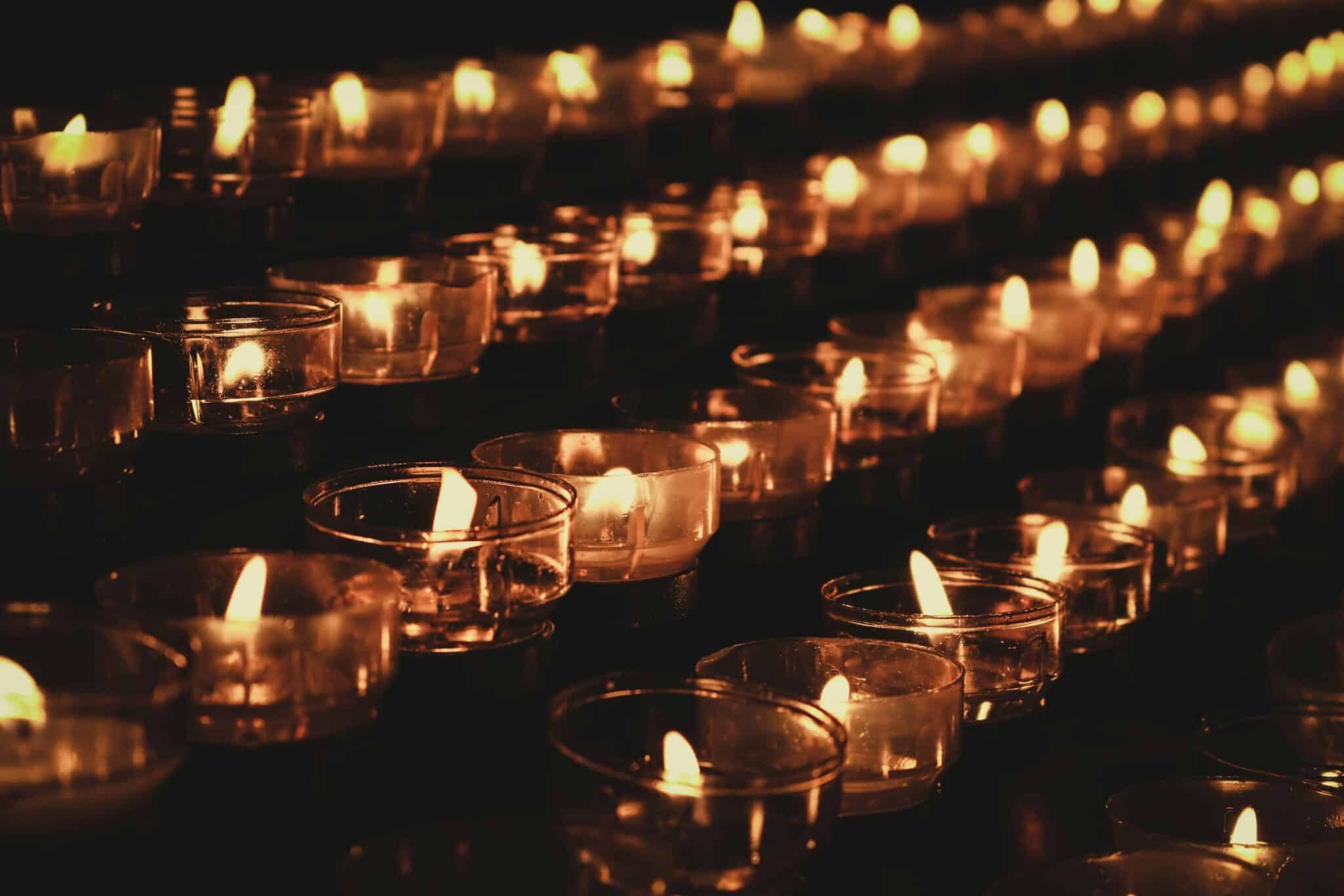 candles in church | Photo by Pascal Müller on Unsplash