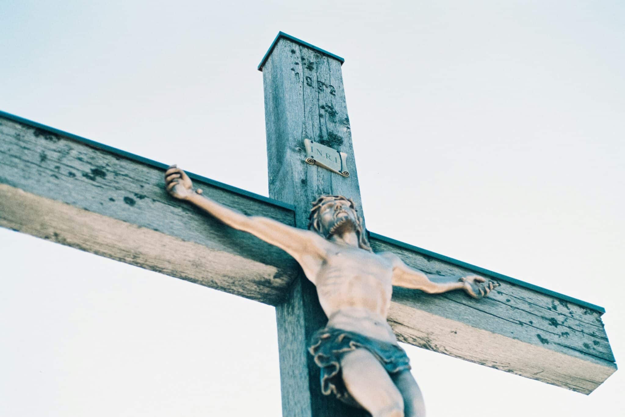 Jesus on a cross | Photo by Christoph Schmid on Unsplash