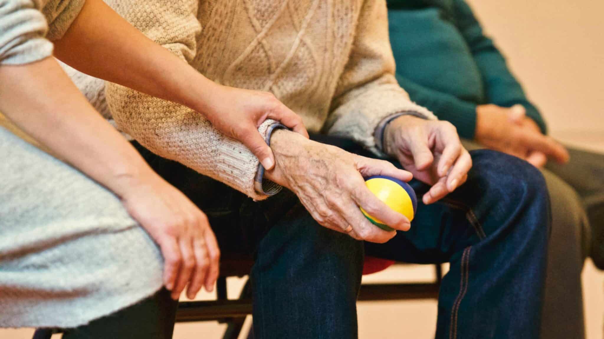 nurse helping an elderly man | Photo by Matthias Zomer: https://www.pexels.com/photo/person-holding-a-stress-ball-339620/