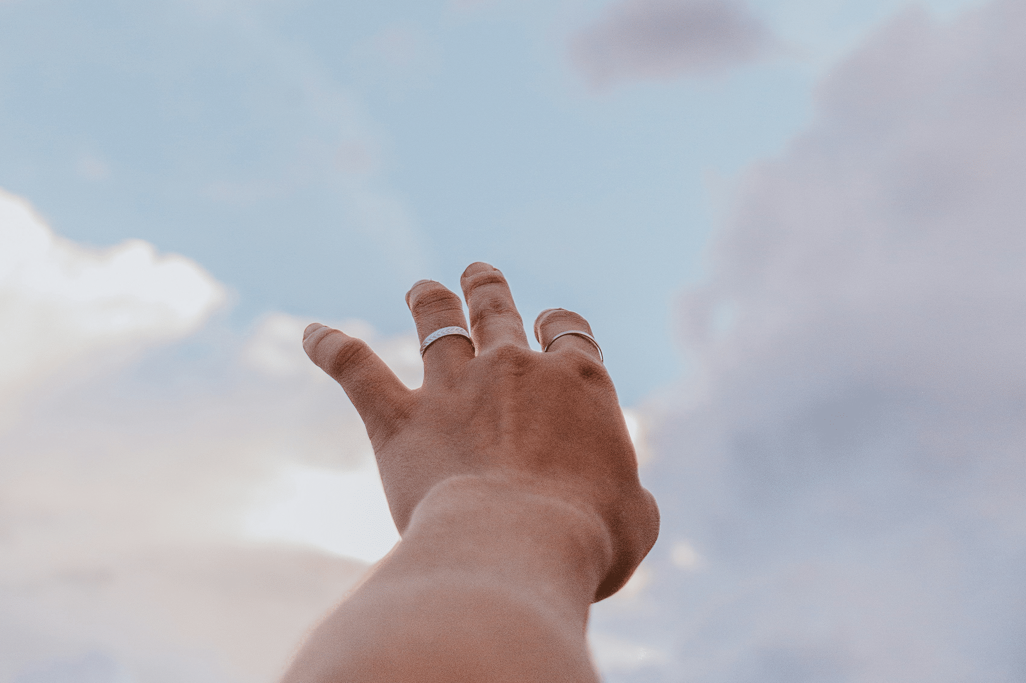 hand reaching for heaven