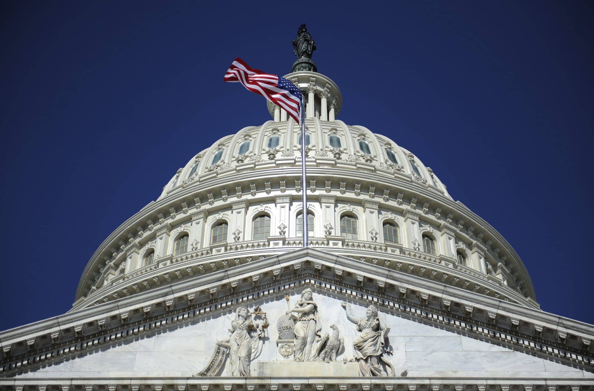 A file photo shows the American flag below the U.S. Capitol dome in Washington. (OSV News photo/Jonathan Ernst, Reuters)