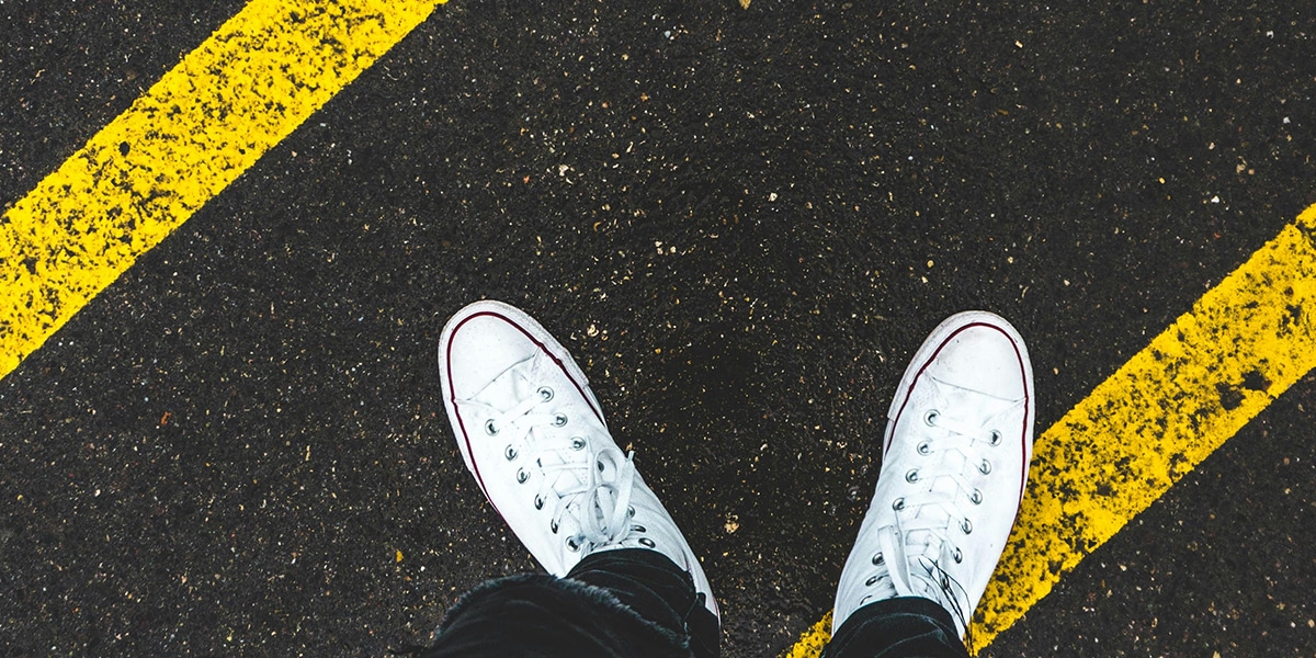 shoes between lines.