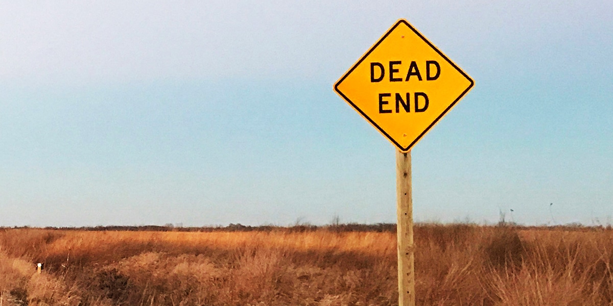 Dead End sign on the side of the road